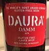 Daura Damm Etikett